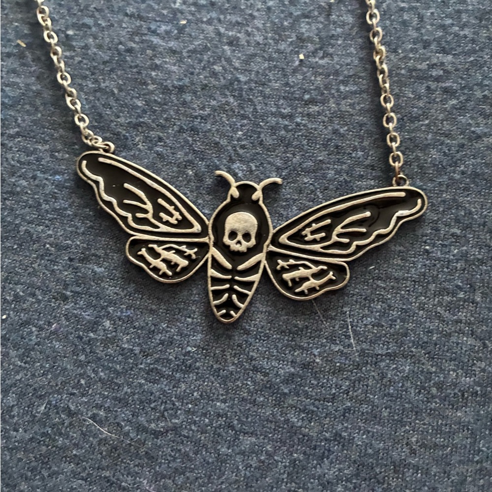 Silver Moth Pendant Necklace with Intricate Wing Details
